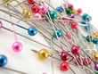 Macro of colorful pins isolated on white Macro of colorful pins isolated on white