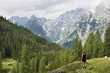 Female hiker enjoying the view in the alps