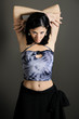 Portrait of young fashion female model posing