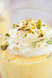 Delicious light dessert with mango mousse and whipped cream Delicious light dessert with mango mousse and whipped cream