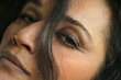 close up of woman's face with hair in front