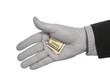 A black and white hand hiding a colorful hundred dollars tip.