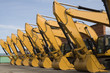 row of excavators row of excavators