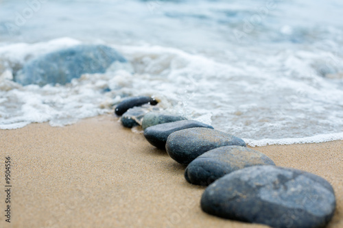 Photo: Abstract path from a pebble. A sea surf. Abstract path from a pebble. A sea surf.