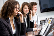 Young customer service operator team working at office,