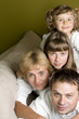 Happy family on sofa