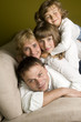 Happy family on sofa