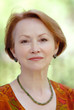 portrait of  woman in  age of on  light green background