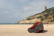 A stranded boat on a deserted beach in Cadiz, South of Spain