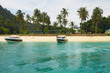 Tropical Island with crystal blue water and coco-trees