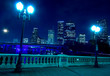 City Skyline at night with bridge in foreground