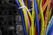 Photo: Color cables in the back of the server rack Color cables in the back of the server rack