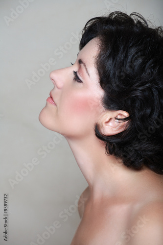 Photo: Beautiful woman in her early 40s late 30s with short curly hair Beautiful woman in her early 40s late 30s with short curly hair
