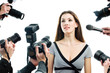 Photograthers are taking a picture of a film star