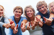 Foto: Young teenagers showing thumbs up Young teenagers showing thumbs up