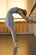 Foto: ballerina is doing exercises in ballet class ballerina is doing exercises in ballet class