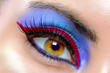 Foto: The macro beautiful female eye The macro beautiful female eye