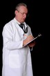 Photo: Senior doctor physician wearing a lab coat Senior doctor physician wearing a lab coat
