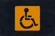 Yellow square marking on black fresh asphalt pavement Yellow square marking on black fresh asphalt pavement