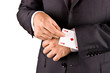 Business man with card and he has an ace up his sleeve