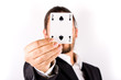 Business man with card and he has an ace up his sleeve