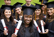 women«s group graduation holding their diplomas