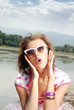 Close-up portrait of the pretty woman in stylish sunglasses Close-up portrait of the pretty woman in stylish sunglasses