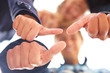 Foto: Macro view of young teens giving the thumbs up sign Macro view of young teens giving the thumbs up sign