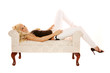 Sexy blond woman on chair