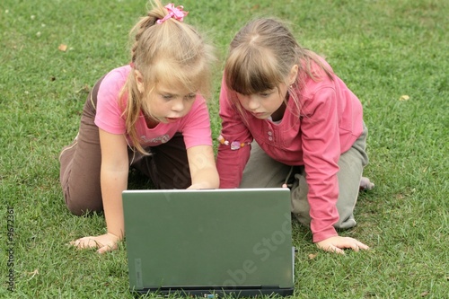 Photo: two girls with laptop two girls with laptop
