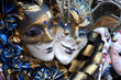 Row of venetian masks in gold and blue