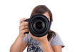 young female photographer with digital slr isolated on white