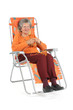 Foto: Grand-mère dans un fauteuil fait du ticot Grand-mère dans un fauteuil fait du ticot