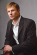 Portrait of  young businessman in classical style