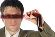 young businessman considers  film,  close up
