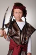 Boy Pirate isolated on black with a cutlass