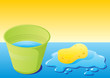 Green bucket with water and sponge with water splash