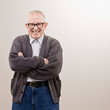Happy, confident man wearing sweater and eyeglasses