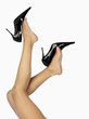 Beautiful legs in black shoes