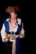 Pirate isolated on black with a cutlass