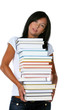 Junge Frau mit einem Bücherstapel