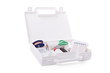 Open first aid kit isolated on white background.