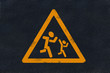 Asphalt children running caution yellow marking Asphalt children running caution yellow marking