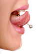 woman sticking out her tongue to show piercing woman sticking out her tongue to show piercing