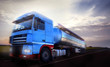Photo: truck driving at dusk/motion blur truck driving at dusk/motion blur
