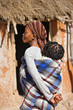 Photo: African mother carry child in a traditional way African mother carry child in a traditional way