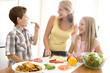 Mother And Children Prepare A meal,mealtime Together