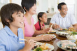 Family Eating A meal,mealtime Together