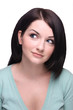 Attractive brunette girl looking to the side on white