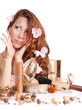 beautiful young girl with cosmetics
